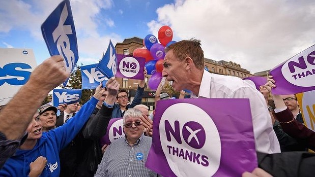 The opposing demonstrations get heated in the streets of Scotland.