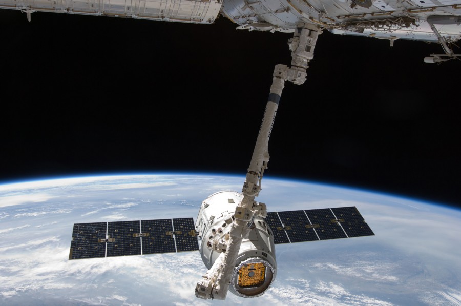 SpaceXs unmanned Dragon Capsule docking with the International Space Station