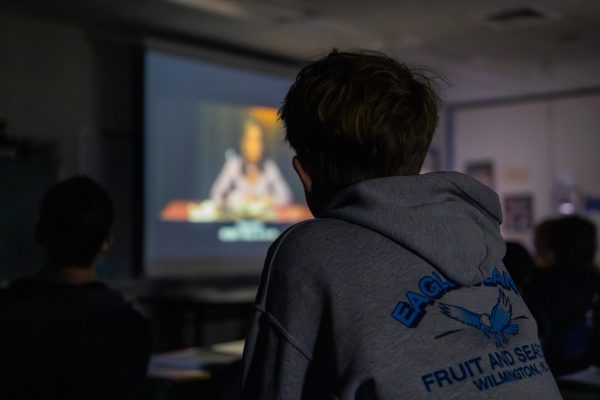 Students watching a film in History Through Film. Photo by Eitan Rubinstein