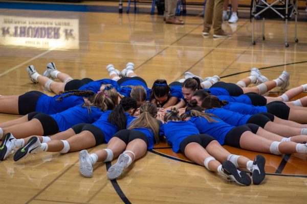 Volleyball defeats town rivals