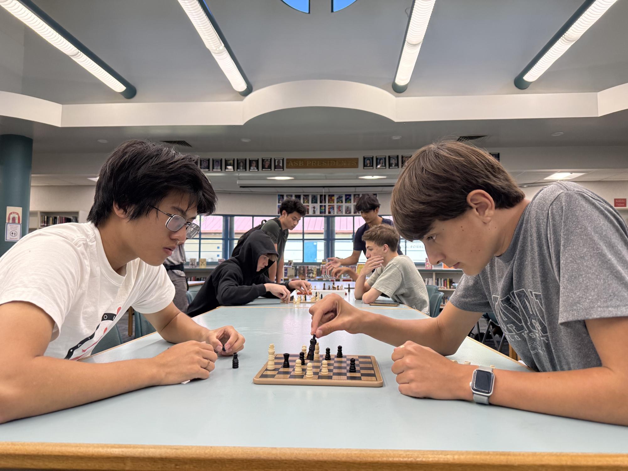 Club members in the library.