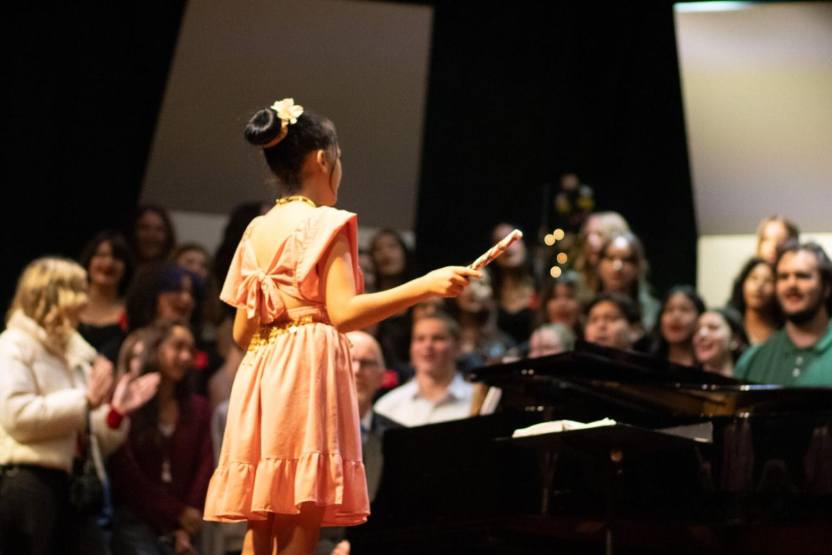 A young volunteer, conducting students of Shawn Spiess
